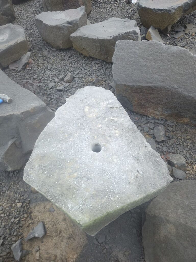 Decorative boulder with holes